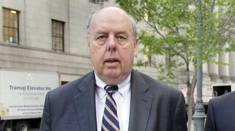 In this April 29, 2011, file photo, Attorney John Dowd walks in New York. Dowd, one of the key lawyers in President Donald Trump’s corner, navigated a popular United States senator through crisis, produced a damning investigative report that drove a baseball star from the game and, early in his career, took on organized crime as a Justice Department prosecutor. Dowd assumed a more prominent place on the legal team after another lawyer, Marc Kasowitz, took a reduced role. (AP Photo/Richard Drew, File)