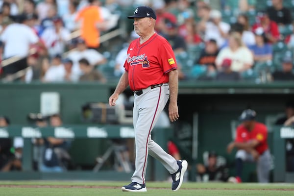 Braves manager Brian Snitker en route to pulling starting pitcher Didier Fuentes ... in the second inning.