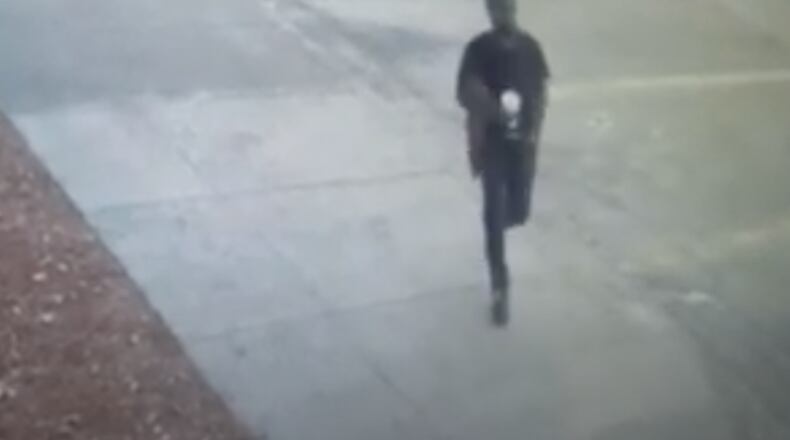 Investigators said the man got into the victims' cars, held them at gunpoint and forced them to drive to local ATMs.