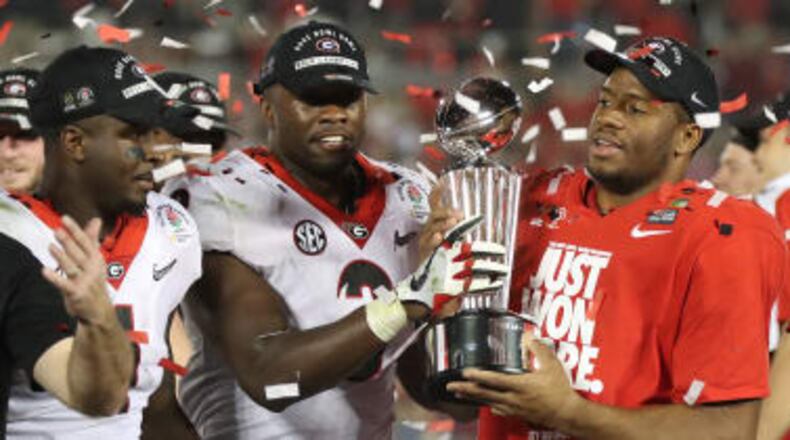 University of Georgia players celebrate after winning the Rose Bowl in a double-overtime thriller.