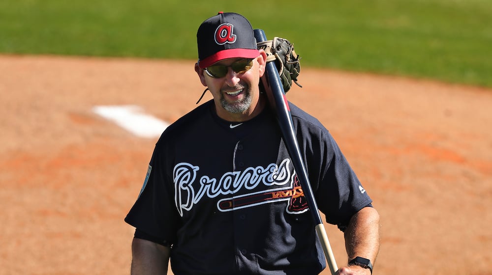 Hi-ho, hi-ho, Braves bench coach Walt Weiss and the tools of his trade report to another day of work at spring training. (Curtis Compton/AJC)