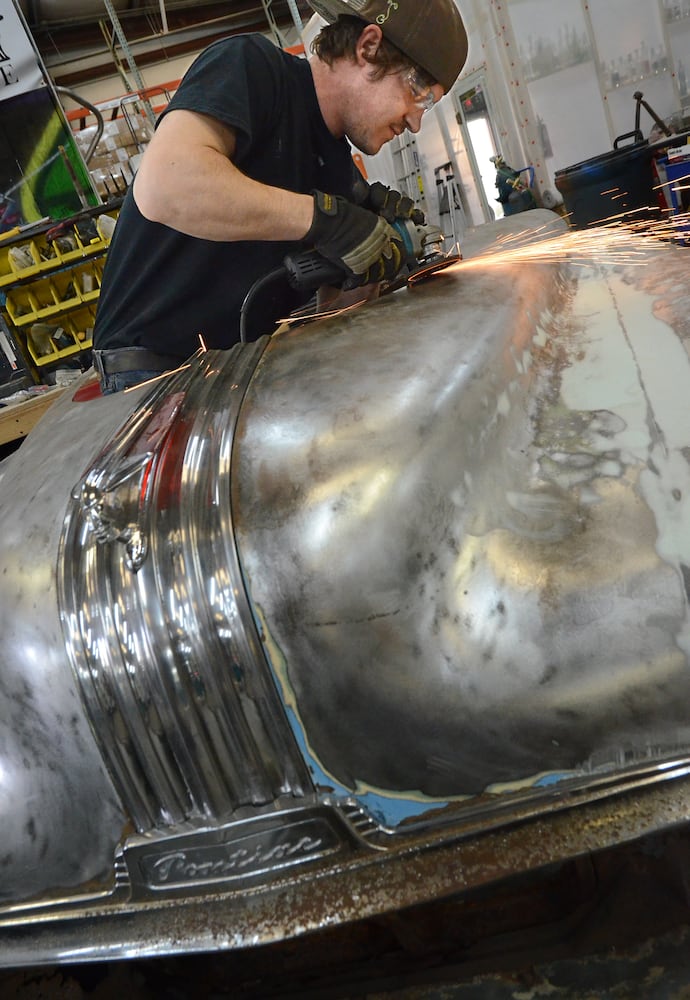 Black Lab Automotive's one-of-a-kind furniture made from classic car parts is likely to create buzz at this year's Atlanta International Auto Show.