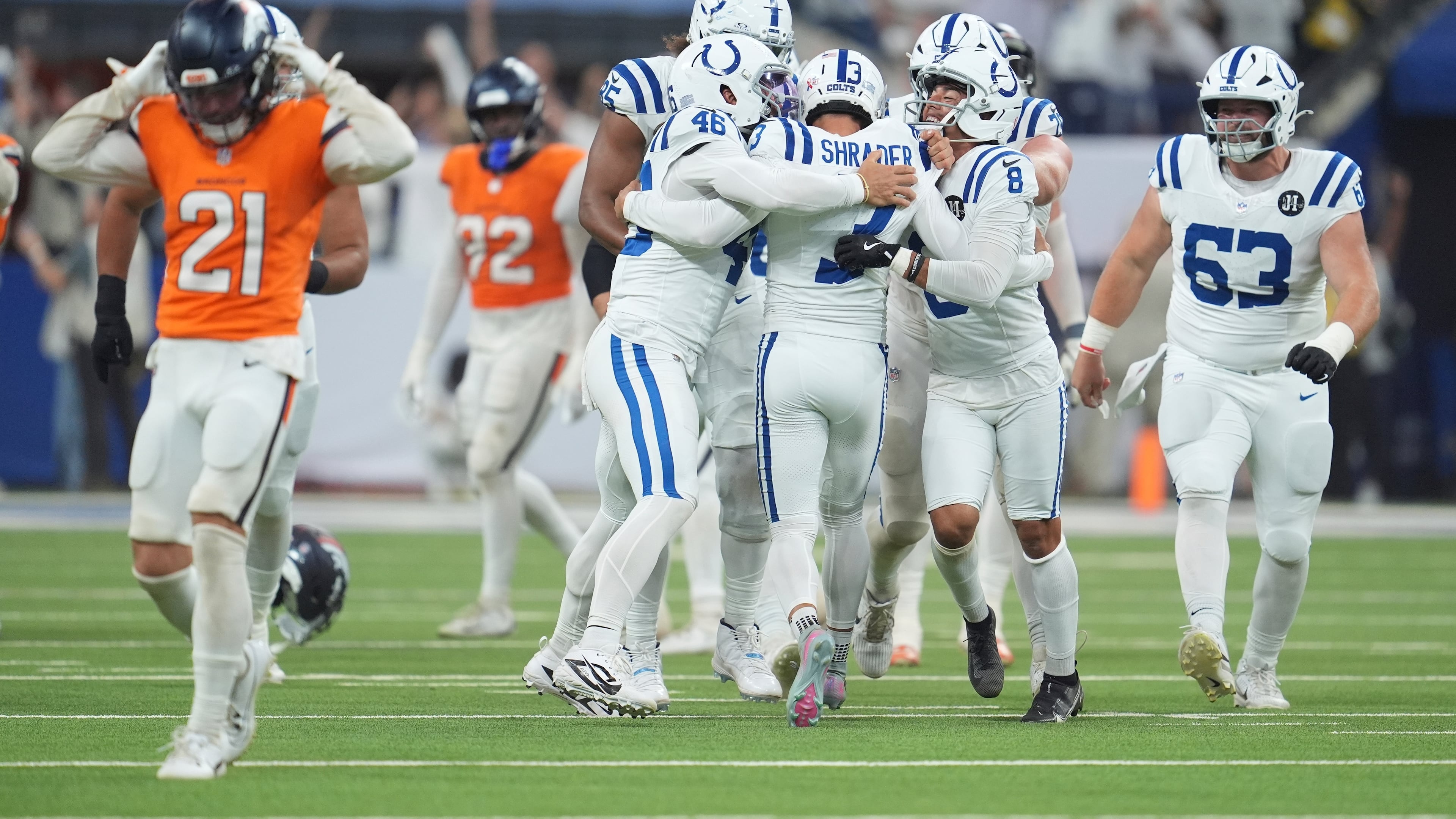 Indianapolis Colts place kicker Spencer Shrader (3) celebrates with teammates after kicking the game winning field goal during the second half an NFL football game against the Denver Broncos, Sunday, Sept. 14, 2025, in Indianapolis. (AP Photo/Michael Conroy)