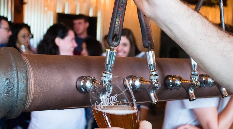 The Monday Night Garage is one of the first new tasting rooms in Atlanta to be opened after the legislative change allowing breweries to sell beer directly to consumers. CONTRIBUTED BY HENRI HOLLIS