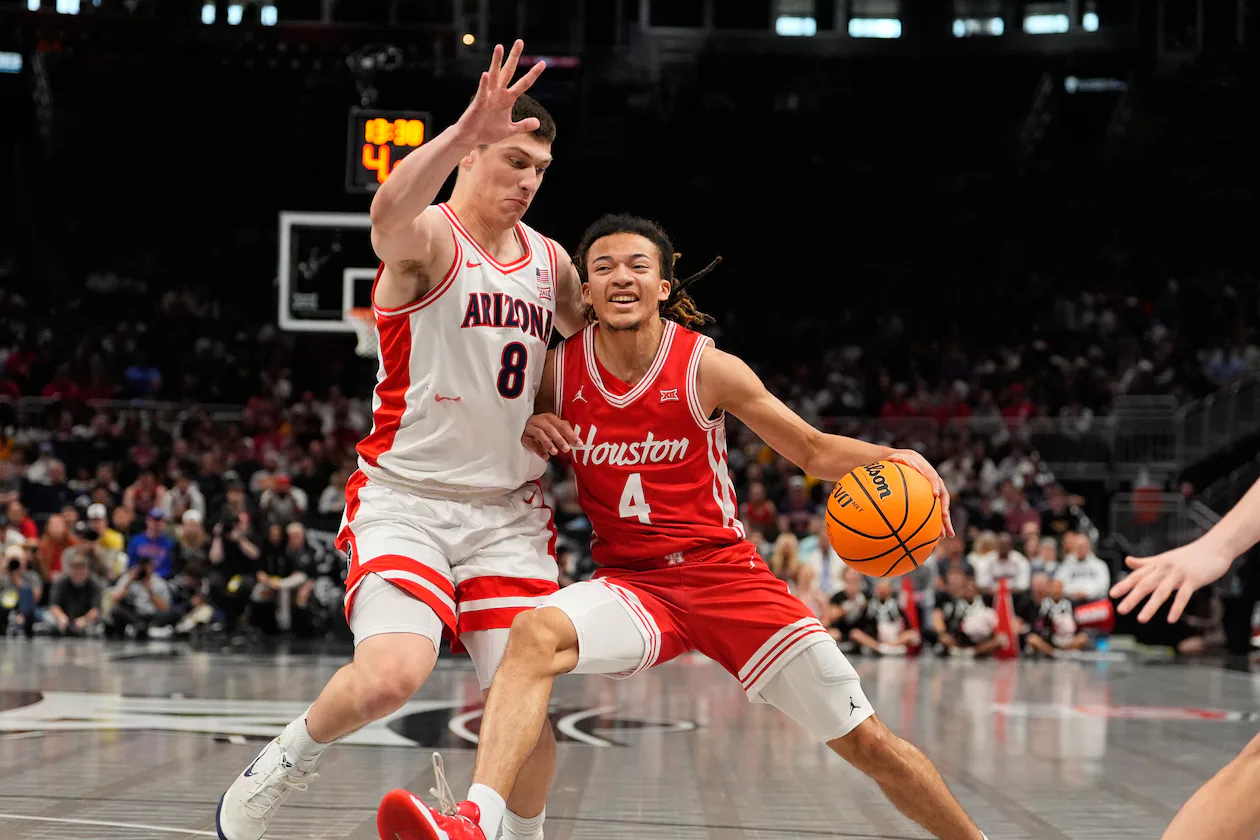 Houston's Kingston Flemings is an explosive athlete a possible draft pick for the Atlanta Hawks. (Charlie Riedel/AP)