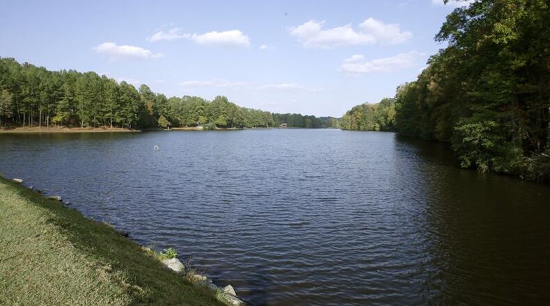 Martin’s Lake is a 46-acre body of water that’s the centerpiece of the Martin’s Landing community in Roswell. The city has agreed to pay the Martin’s Landing Foundation $500,000 to settle a dispute over upkeep of the lake. AJC FILE