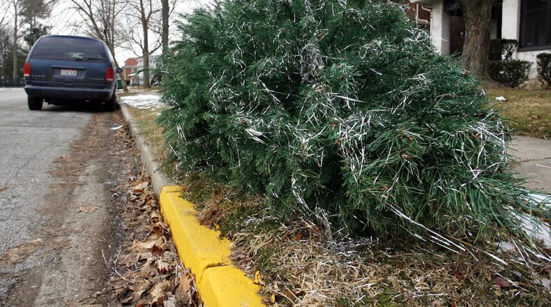 DeKalb County is offering curbside Christmas tree collection through Jan. 17. AJC file photo