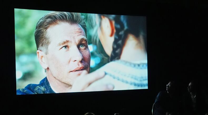 People watch a trailer for the upcoming film “As Deep as the Grave” featuring a character played by a generative AI version of Val Kilmer at CinemaCon on Wednesday, April 15, 2026, at Caesars Palace in Las Vegas. (AP Photo/Chris Pizzello)