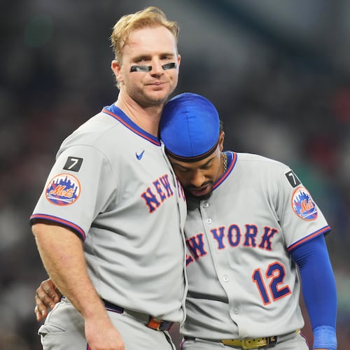 FILE - New York Mets' Pete Alonso, left, stands with Francisco Lindor after flying out with the bases loaded during the fifth inning of a baseball game against the Miami Marlins, Sunday, Sept. 28, 2025, in Miami. (AP Photo/Lynne Sladky, File)