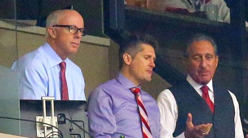 Falcons president Rich McKay (from left), general manager Thomas Dimitroff and owner Arthur Blank watch the Falcons play the Buccaneers at the Georgia Dome in Atlanta in December of 2012. Curtis Compton, ccompton@ajc.com