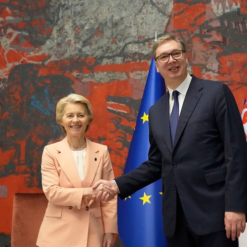 FILE - European Commission President Ursula von der Leyen, center, shakes hands with Serbian President Aleksandar Vucic in Belgrade, Serbia, on Oct. 25, 2024. (AP Photo/Darko Vojinovic, File)
