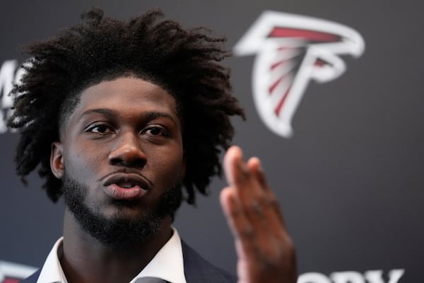 Atlanta Falcons first-round draft pick Jalon Walker speaks during a news conference, Friday, April 25, 2025, in Flowery Branch, Ga. (AP Photo/Brynn Anderson,)