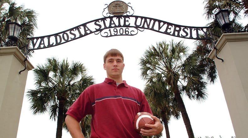 Valdosta State quarterback Buster Faulkner is pictured in the school's archway during the 2002 season. Twenty years later, he was hired as offensive coordinator at Georgia Tech. (Todd Stone/AP file photo)