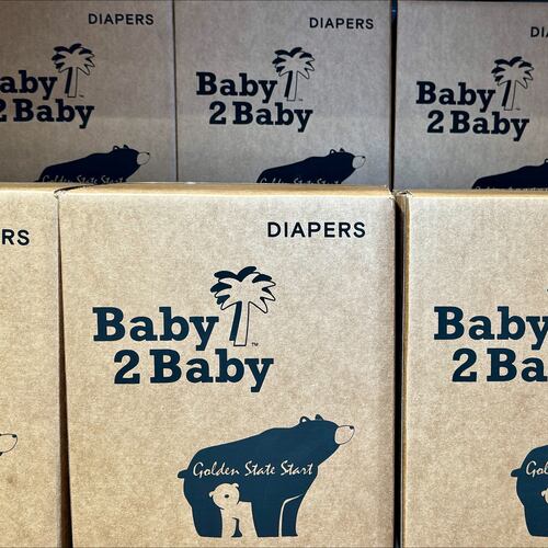 This photo provided by Baby2Baby shows stacks of packaged diapers Wednesday, May 7, 2026, at Baby2Baby's Los Angeles headquarters. (Baby2Baby via AP)