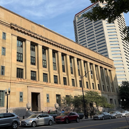 Cars sit parked in front of the United States District Court for the Southern District of Ohio Thursday, July 16, 2026, in Columbus, Ohio. (AP Photo/Patrick Aftoora-Orsagos)