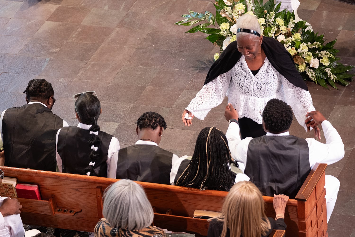 Tianah Robinson’s aunt Shirley Clanton greets the family after giving a reflection during a celebration of life at Ebenezer Baptist Church on Saturday, April 18, 2026, in Atlanta. (Ben Gray for the AJC)
