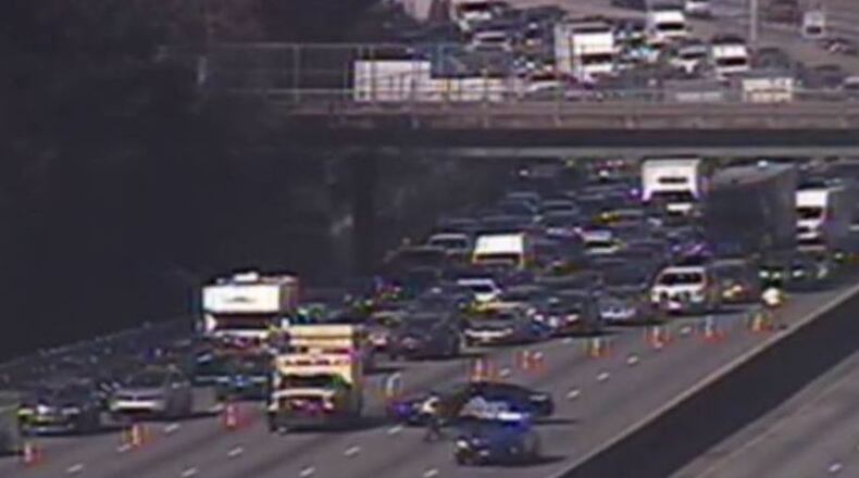 Authorities are investigating a deadly crash that shut down I-285 East in Sandy Springs.