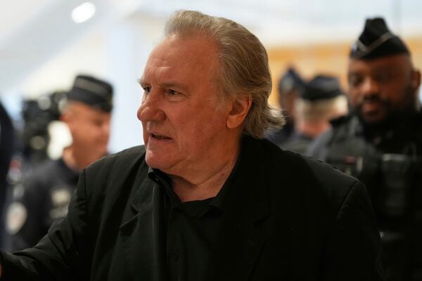 French actor Gerard Depardieu leaves for a break during his trial for the alleged sexual assaults of two women on a film set in 2021, Wednesday, March 26, 2025 in Paris. (AP Photo/Aurelien Morissard)