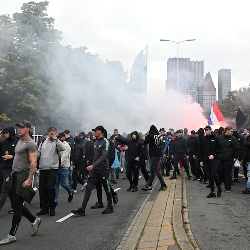 Protesters attend a far-right groups' protest against immigration and asylum policies, in The Hague, Netherlands, Saturday, Sept. 19, 2026. (AP Photo/Mouneb Taim)