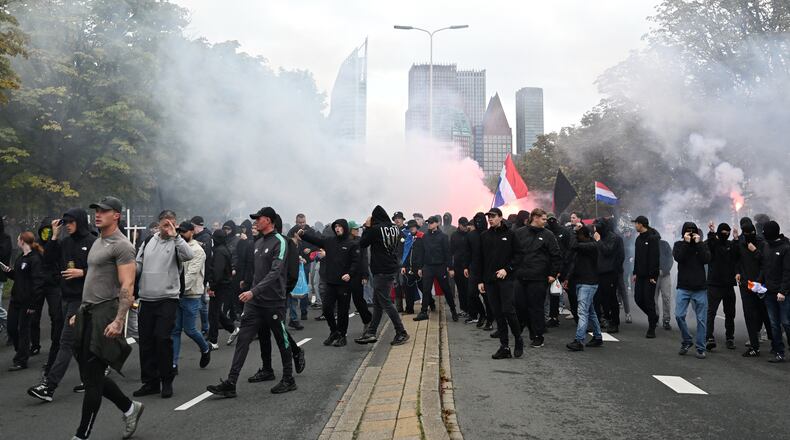 Protesters attend a far-right groups' protest against immigration and asylum policies, in The Hague, Netherlands, Saturday, Sept. 19, 2026. (AP Photo/Mouneb Taim)