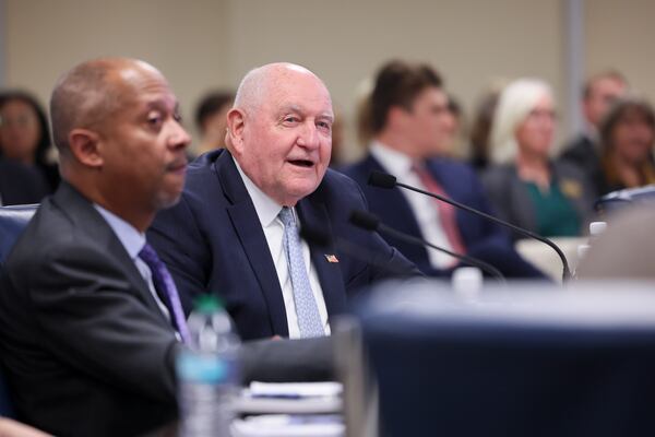 University System of Georgia Chancellor Sonny Perdue (right) says that research funding has been withheld as part of the Department of Government Efficiency initiative of the Trump administration.