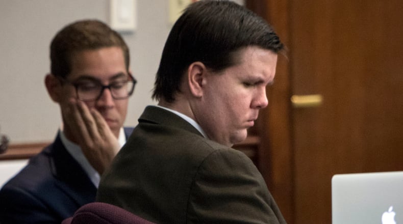 Justin Ross Harris during testimony at his trial in the Glynn County courthouse in Brunswick. At left is a member of his defense team, Carlos Rodriguez. (The Atlanta Journal-Constitution / Stephen Morton)