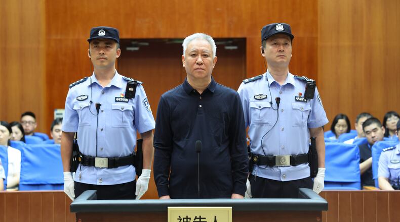 In this handout photo released by Xinhua News Agency, Hui Ka Yan, also known as Xu Jiayin, founder of property developer Evergrande stands trial at the Shenzhen Intermediate People's Court in Shenzhen, south China's Guangdong Province, Thursday, Aug. 20, 2026. (Shenzhen Intermediate People's Court/Xinhua via AP)