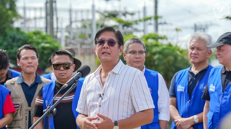 In this photo provided by the Malacanang Presidential Communications Office, Philippine President Ferdinand Marcos Jr., speaks during the launching of Metro Cebu Waterways Clearing in Cebu city, central Philippines, Friday Nov. 21, 2025. (Malacanang Presidential Communications Office via AP)
