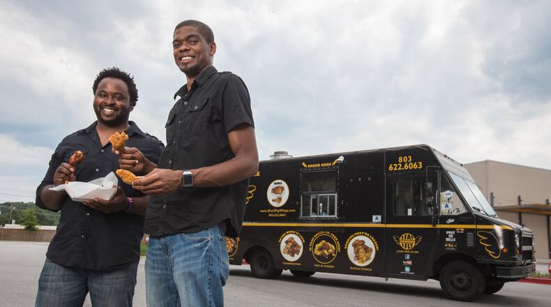 Ramone Dickerson and Corey Simmons in Columbia, S.C. on Wednesday, July 30, 2014. (Oprah Winfrey Network Photo/Bob Leverone) The 2 Fat 2 Fly food truck (OWN)