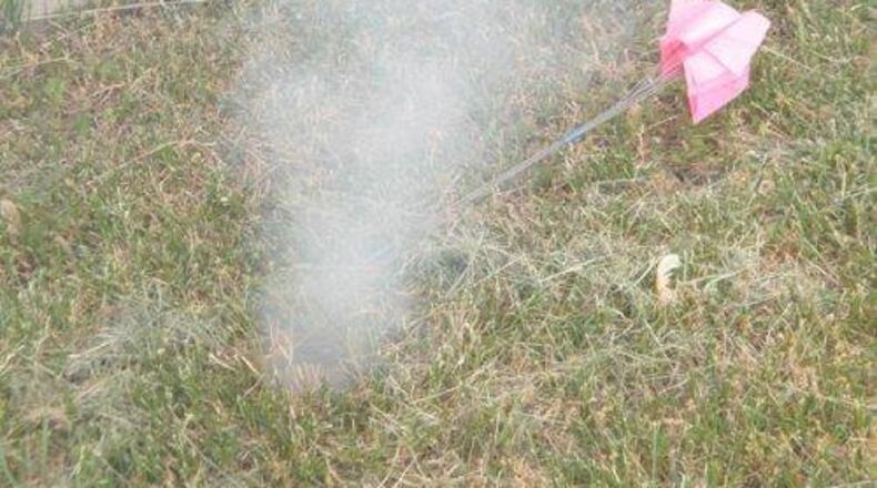 Smoke rising from the ground indicates a breach in sewer pipes below