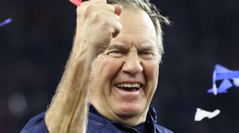 New England Patriots head coach Bill Belichick pumps his fist after beating the Atlanta Falcons, 34-28, in Super Bowl LI on February 5, 2017, at NRG Stadium in Houston, Texas. (Curtis Compton/Atlanta Journal-Constitution/TNS)