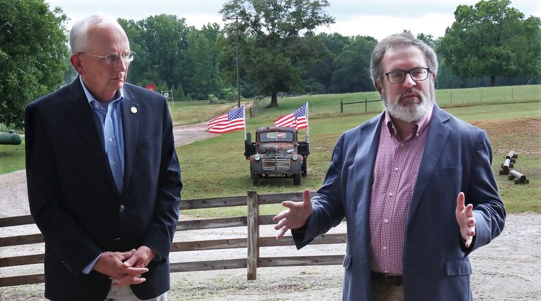 052720 McDonough: U.S. Environmental Protection Agency (EPA) Administrator Andrew Wheeler (right) takes questions from farmers and the media with Georgia Agriculture Commissioner Gary Black (left) looking on while kicking off his Georgia swing at Southern Belle Farm on Wednesday, May 27, 2020, in McDonough. Curtis Compton ccompton@ajc.com