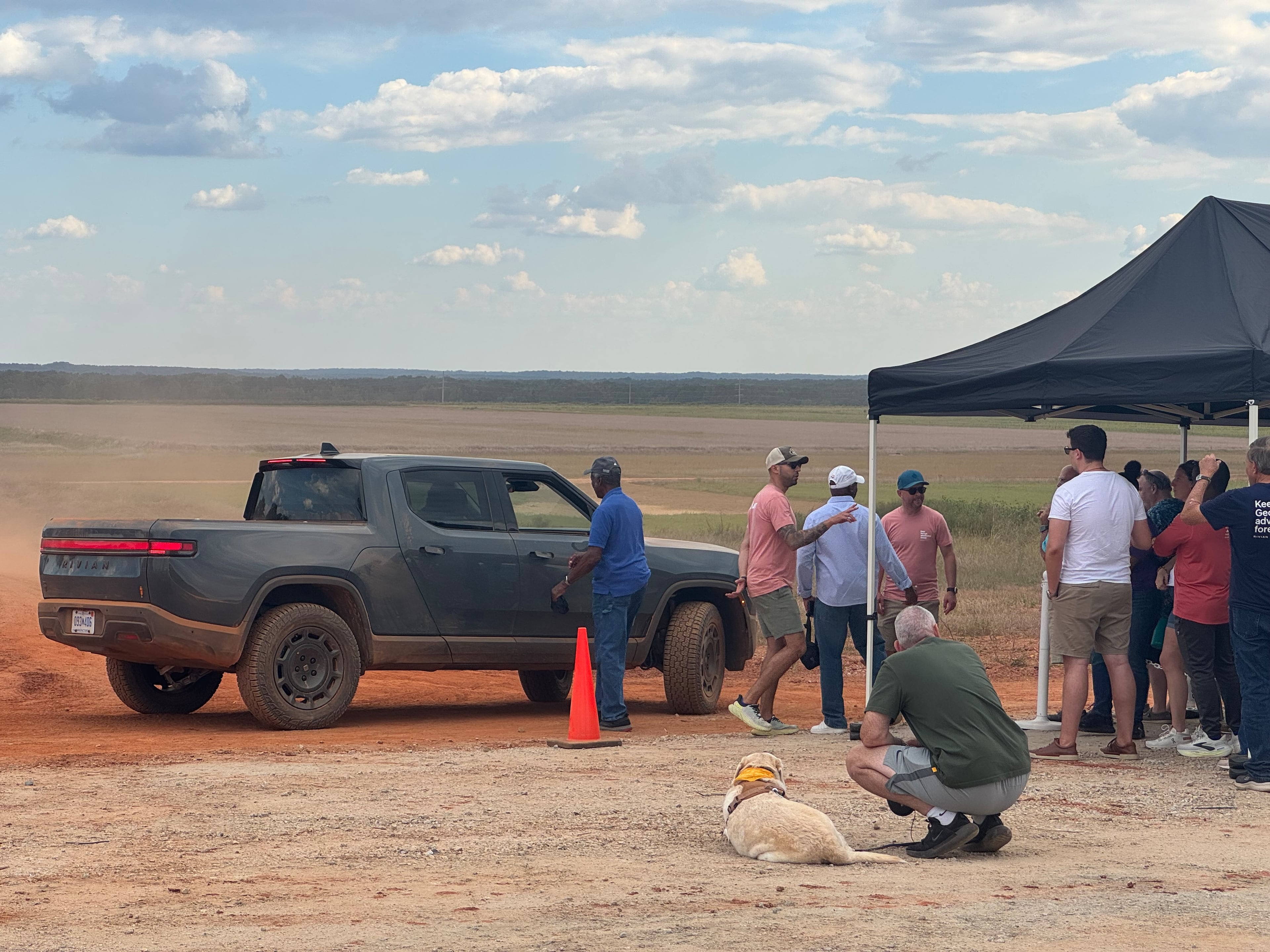 Attendees of the Rivian event wait to be driven on an off-roading coursen Sunday, Sept. 14, 2025. (Caleb Groves/AJC)