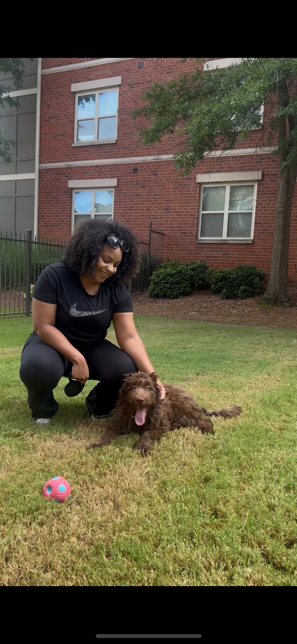 Aniyah Anderson was sad to lose Juju. But she got another dog, Zeina the Aussiedoodle. (Courtesy of Aniyah Anderson)
