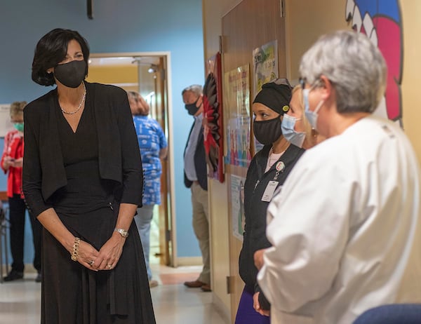 May 20, 2021: Dr. Rochelle Walensky, left, Director of the Centers for Disease Control and Prevention, thanks a group of medical workers at the Whitfield County Health Department in Dalton. The CDC has come under criticism for its vaccination strategy and its handling of messaging to the public. (Alyssa Pointer / AJC file photo 2021)