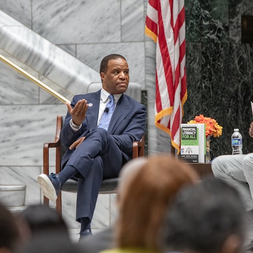 Operation HOPE CEO John Hope Bryant (left) and Atlanta Mayor Andre Dickens discuss the “American Aspiration Tour” in July. Bryant has joined with CIM Group to “address the immense need for affordable housing … .” (Jenni Girtman for the AJC)