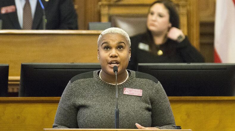 State Rep. Erica Thomas, D - Austell, held a press conference Monday where she repeated that, during a confrontation over rules in a grocery store express lane, a man told her to “go back,” echoing divisive tweets that President Donald Trump aimed at four congresswomen of color telling them they should “go back” to where they came from. The man admits calling Thomas an expletive but denies saying he told her to “go back.” (ALYSSA POINTER/ALYSSA.POINTER@AJC.COM)