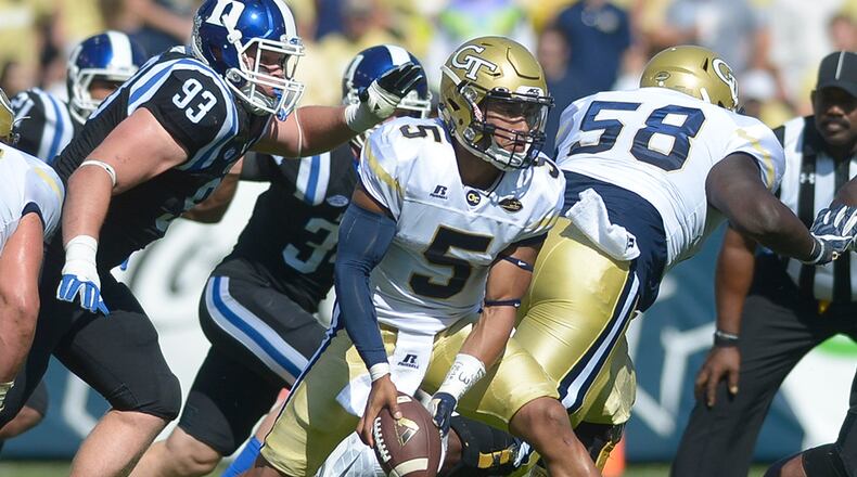 Georgia Tech senior QB Justin Thomas (5) sets up for a handoff in the first half of the game Saturday, October 29, 2016. SPECIAL/Daniel Varnado