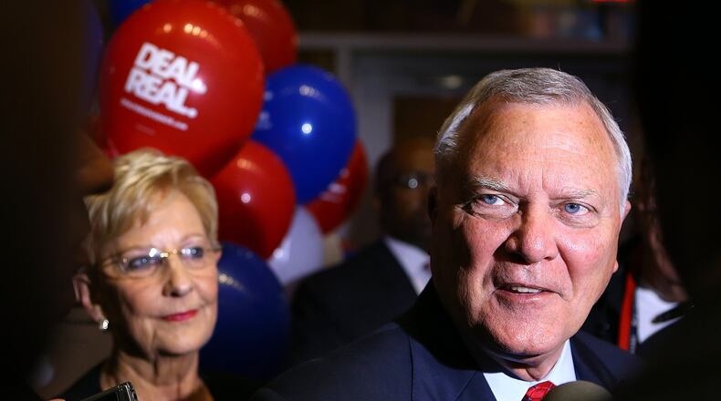 Gov. Nathan Deal and Georgia First Lady Sandra Deal arrive at the Georgia Republican Party Election Night Victory Party in the College Football Hall of Fame on election night. Deal will attempt fixes to the state’s educational funding formula, ethics commission and criminal justice system in his second term. CURTIS COMPTON / CCOMPTON@AJC.COM