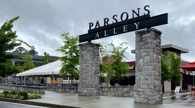Rain or shine, downtown Duluth patrons can enjoy meals and beverages while maintaining social distancing thanks to temporary tents. (Photo by Karen Huppertz for the AJC)