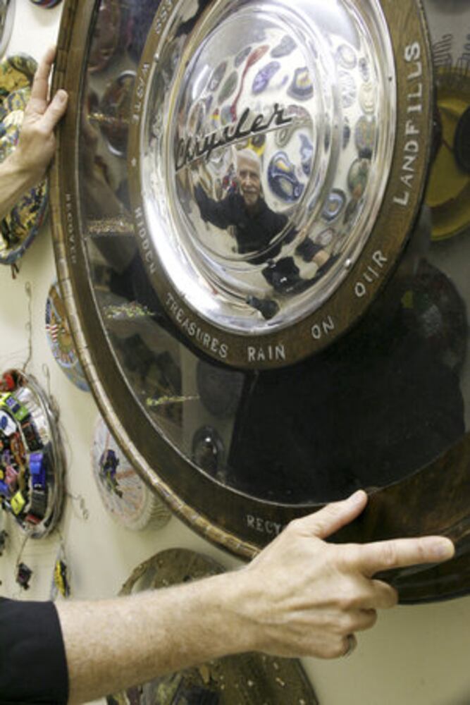 Hubcap art adds vroom to room