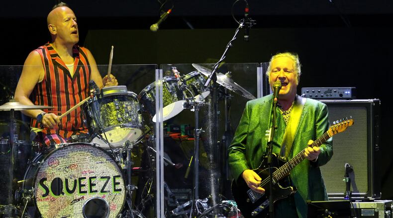 Squeeze perform "Tempted" as the Brit-pop band opened the concert with a one-hour set Friday, September 24, 2021, at Ameris Bank Amphitheatre in Alpharetta. Then Hall & Oates performed many of their pop duo classic hits. (Photo: Robb Cohen for The Atlanta Journal-Constitution)