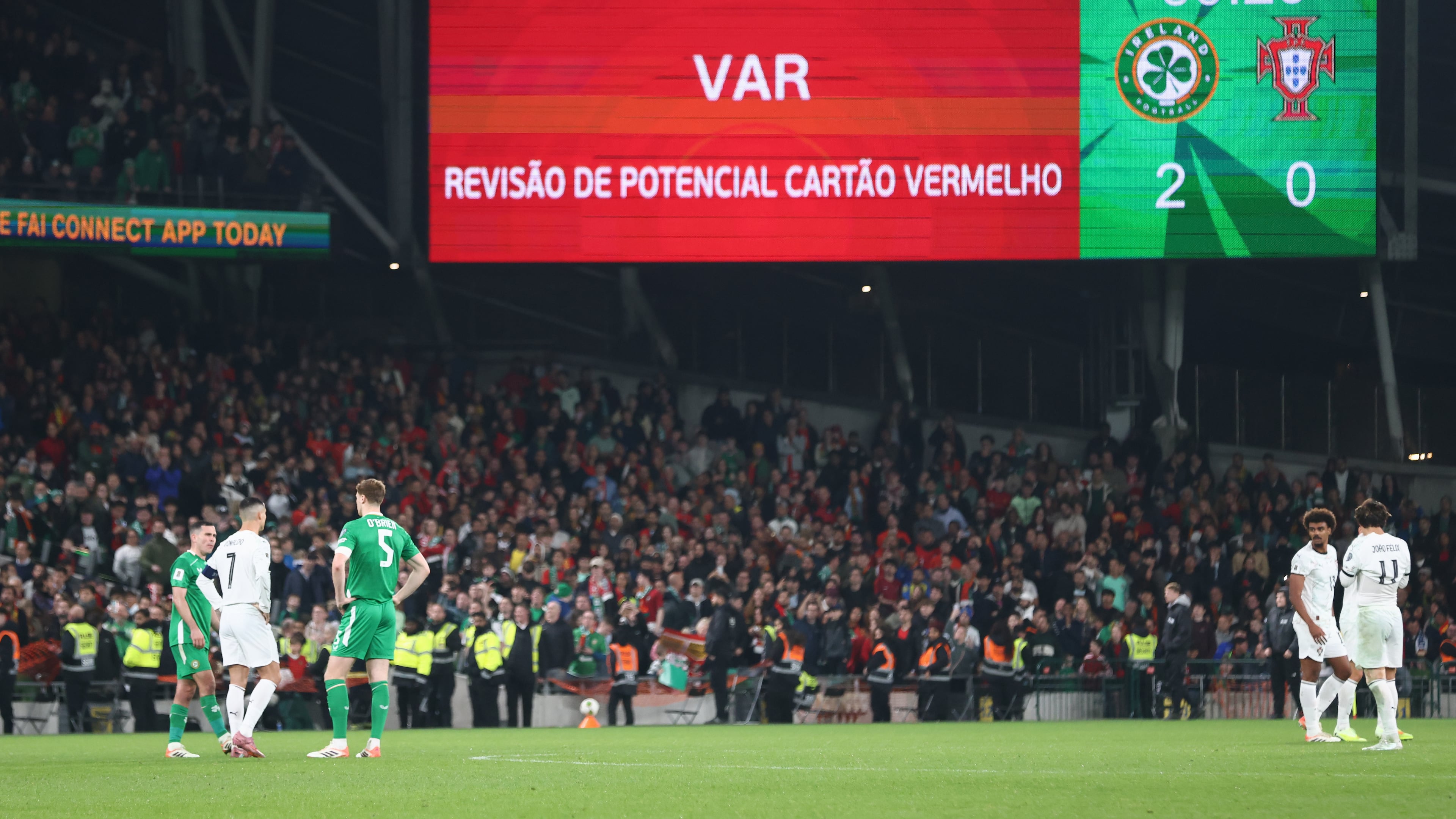 A VAR check on Portugal's Cristiano Ronaldo red card displays the decision was correct during a World Cup 2026 group F qualifying soccer match between Ireland and Portugal in Dublin, Thursday, Nov. 13, 2025. (AP Photo/Peter Morrison)