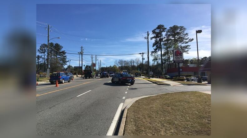 A deadly motorcycle crash shut down part of Roswell Road Saturday afternoon in Sandy Springs, police said.