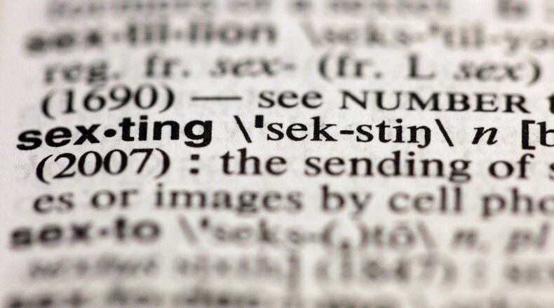 The word "sexting" is just one example of teen slang that was added to the 11th edition of Merriam-Webster's Collegiate Dictionary in 2012. Slang, driven by cultural and technological changes of today, offers insight into language of the future. (Image by Richard Drew/AP)
