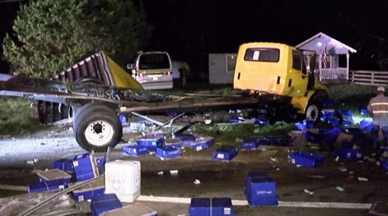 Drug bottles and syringes were scattered across a road in Texas early Friday after two trucks collided.