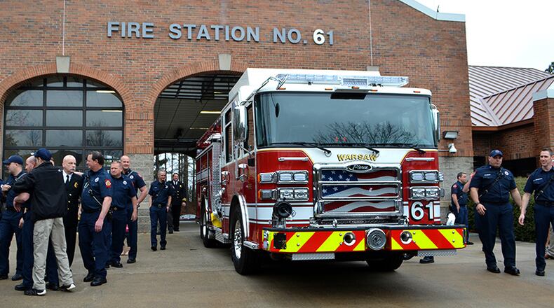 Johns Creek Fire Department personnel participate in a “push-in” ceremony for a new pumper truck Feb. 15 at Station No. 61, 10265 Medlock Bridge Parkway. CITY OF JOHNS CREEK