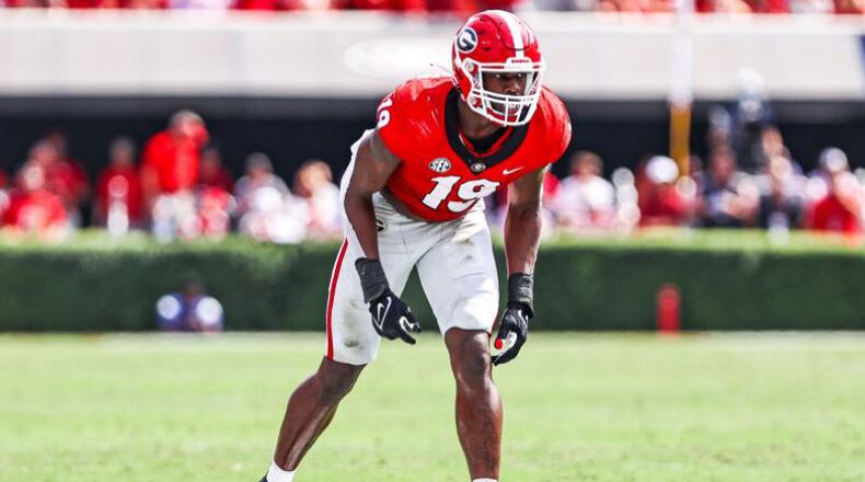 Georgia outside linebacker Adam Anderson (19) gets set to rush the pass during the Bulldogs’ game against Arkansas on Dooley Field at Sanford Stadium in Athens on Saturday, Oct. 2, 2021. (Photo by Tony Walsh/UGA Athletics)
