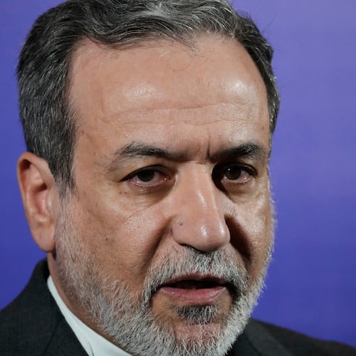 Iranian Foreign Minister Abbas Araghchi speaks in a new briefing after attending a conference titled "International Law Under Assault: Aggression and Self-Defense," in Tehran, Iran, Sunday, Nov. 16, 2025. (AP Photo/Vahid Salemi)
