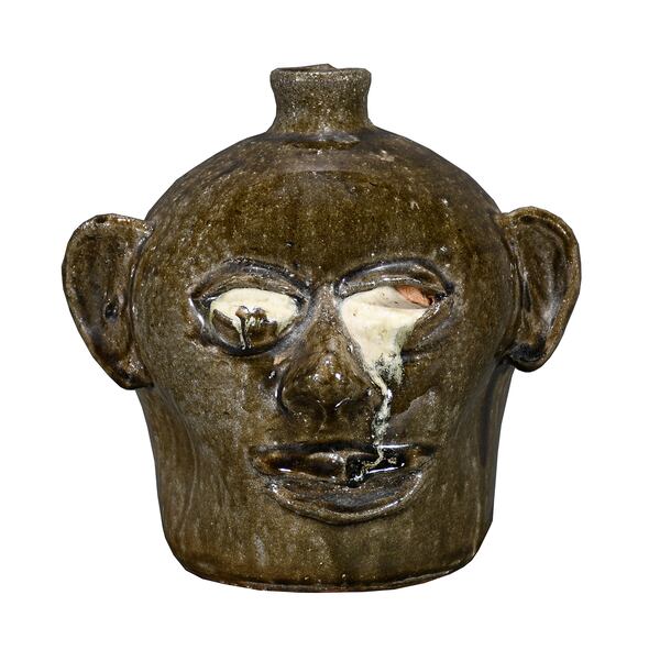 "Runny" eyes on a Lanier Meaders face jug increases its value.
(Courtesy of Slotin Auction)